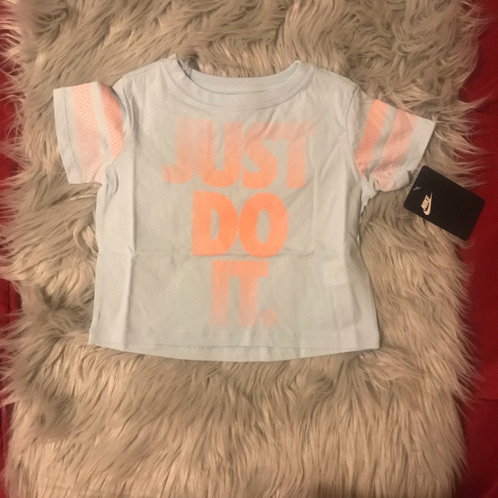 Nike size 4 tee